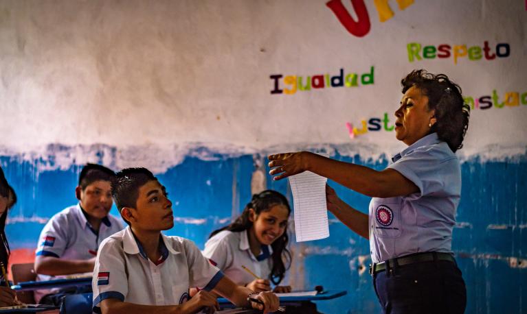 Students and teacher at a college in Guatemala. © ShutterPrice | Shutterstock ID: 1223048173