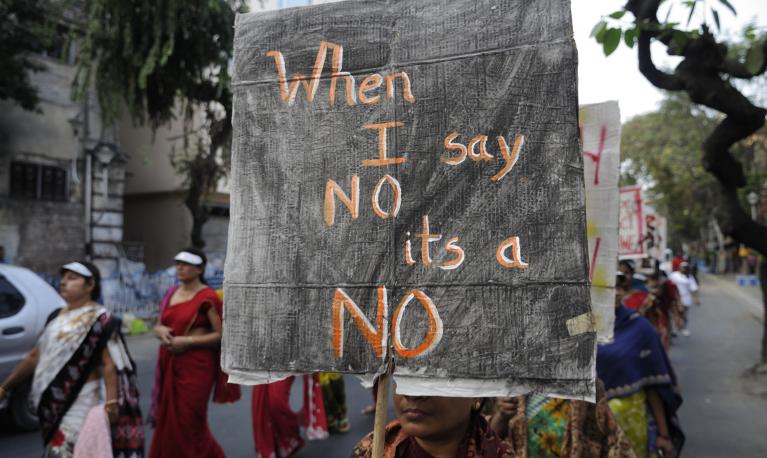 Women with a banner emphasising the importance of ‘No’ as the basis for women's consent during a rally in Kolkata to remember the life of a gang rape victim from New Delhi, India. 16 December 2014.  © arindambanerjee | Shutterstock.com