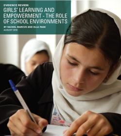 Girl with pen in classroom