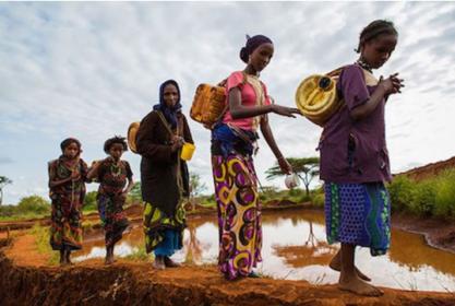 Women going to collect water