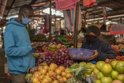 A market seller in Kenya. ©World Bank / Sambrian Mbaabu