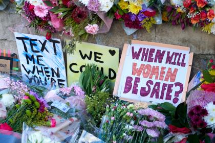 Flowers with messages about women’s safety left by people who attended a vigil for Sarah Everard in Clapham Common. March 2021, London. Credit: Vincenzo Lullo/Shutterstock.com