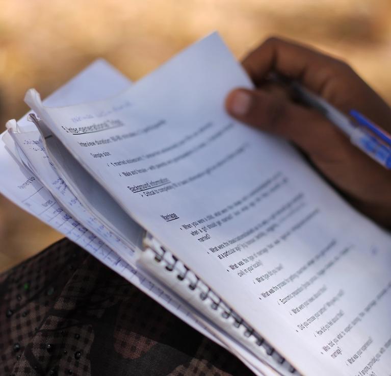 A girl looking at an exam paper