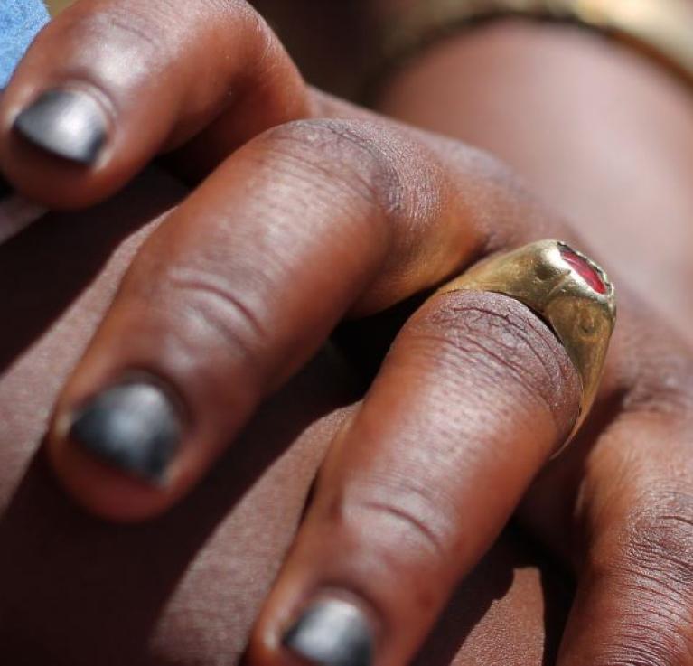 A close up of a women's decorated hands