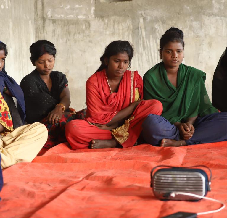 Girls in Eastern Terai, Nepal meet twice a week to listen PMC's 'Hilkor (Ripples in water)' Drama. The drama covers the story of child marriage and gender based violence.  ©PMC