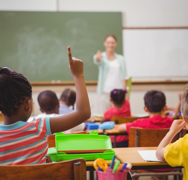 Pupils raising their hands during class at the elementary school. © Wavebreakmedia/Stock Photo ID: 247119898