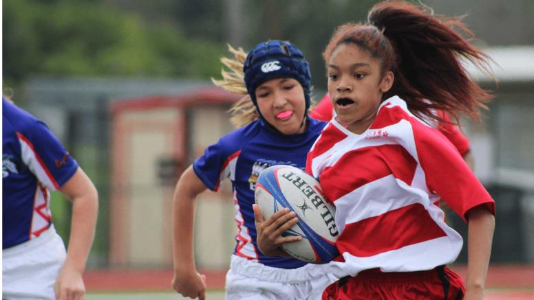 Girls playing rugby ©Women Win