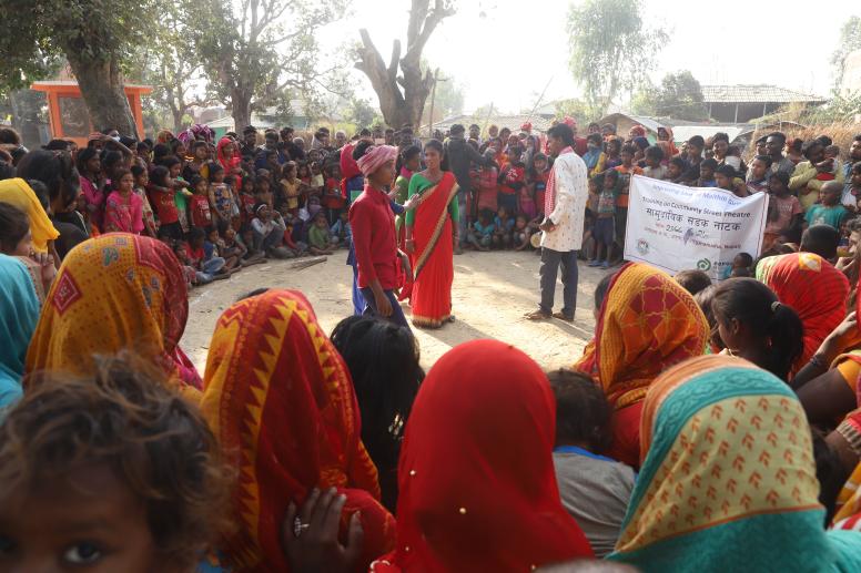 Actors perform a 30-minute street drama on child marriage in their village. PMC provided community theatre training to girls who have dropped out of school or never attended and are in high risk of child marriage.  ©PMC