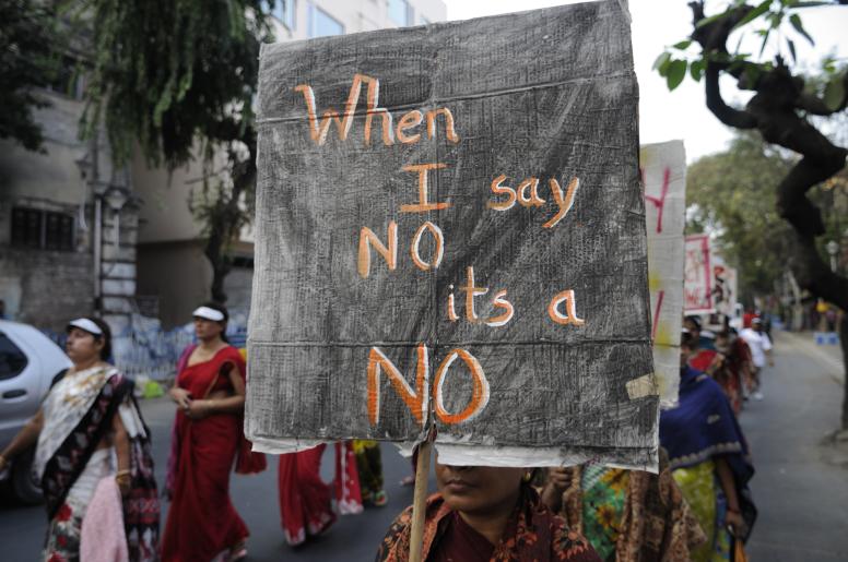 Women with a banner emphasising the importance of ‘No’ as the basis for women's consent during a rally in Kolkata to remember the life of a gang rape victim from New Delhi, India. 16 December 2014. © arindambanerjee | Shutterstock.com