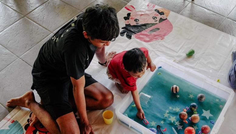 Fathers join their children in learning activities during setara playdate (equal playdate) in Bali, Indonesia, August 2026. © Kopernik